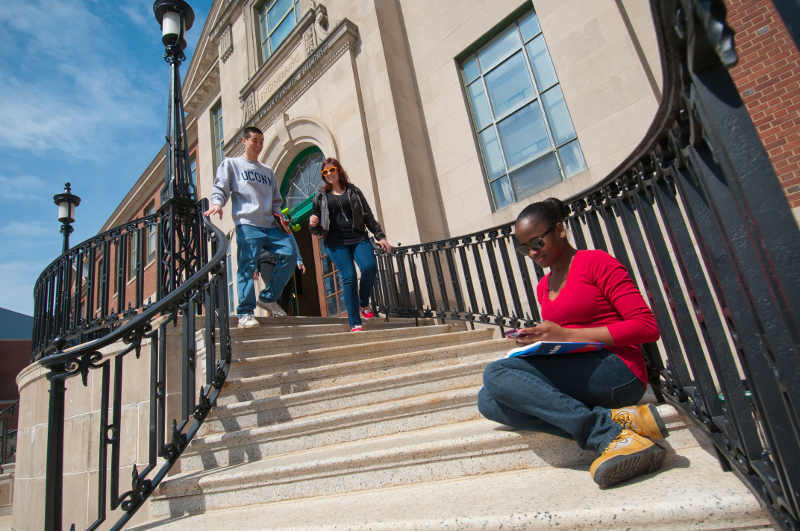 Students walking down the front stairs of the Engineering Building