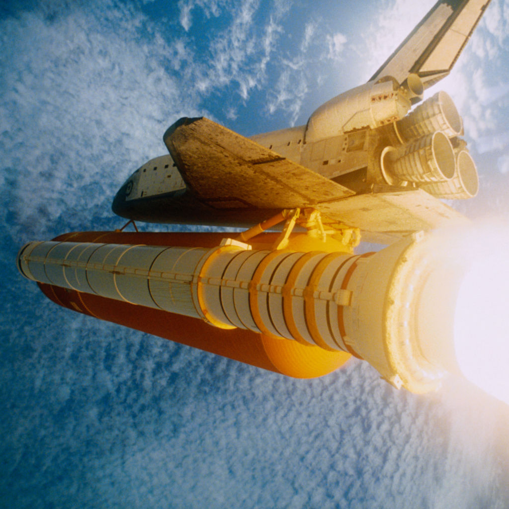 space shuttle flying into space